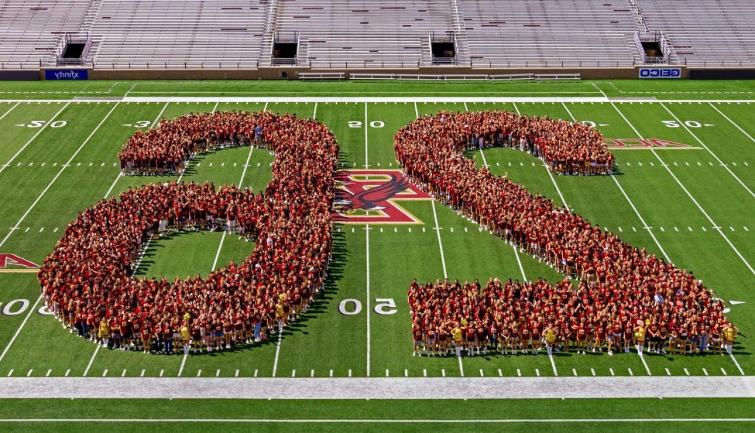 students form '26' in Alumni Stadium