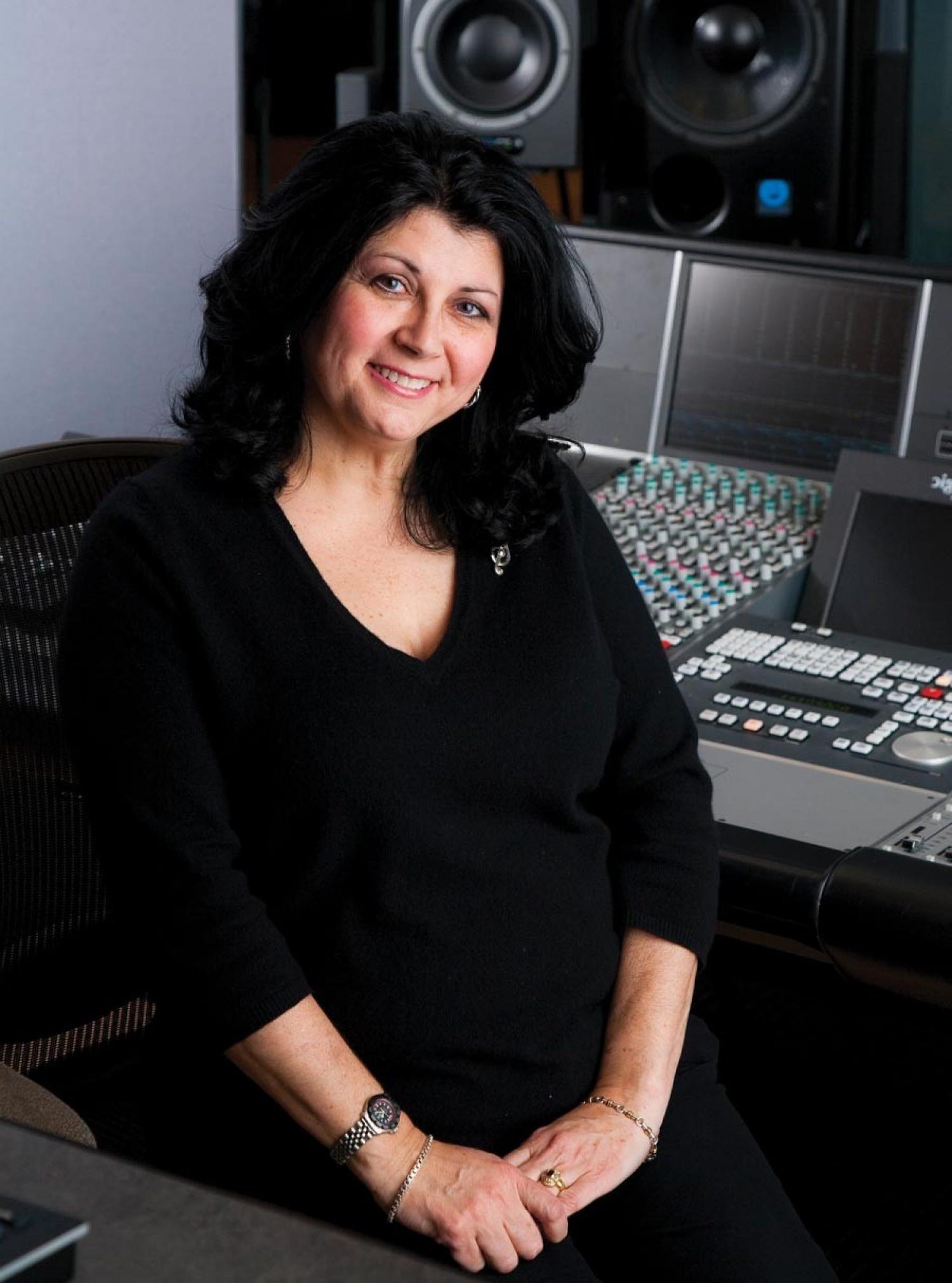 Laura Carlo photographed in a sound production booth