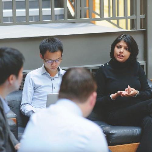 MBA students in Fulton lobby