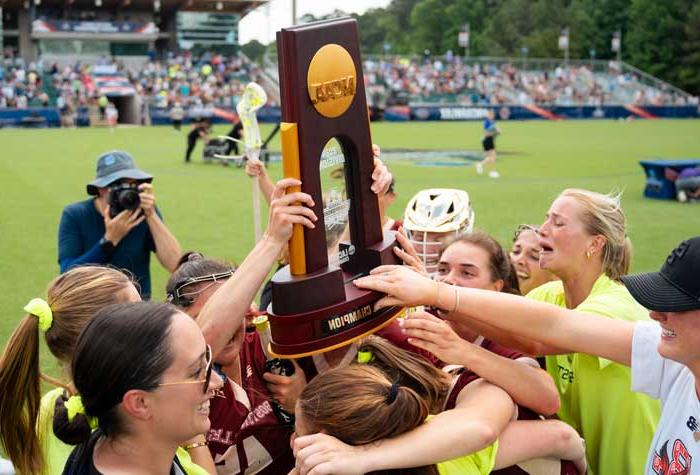 Photograph of the BC women's lacrosse players and coaching staff